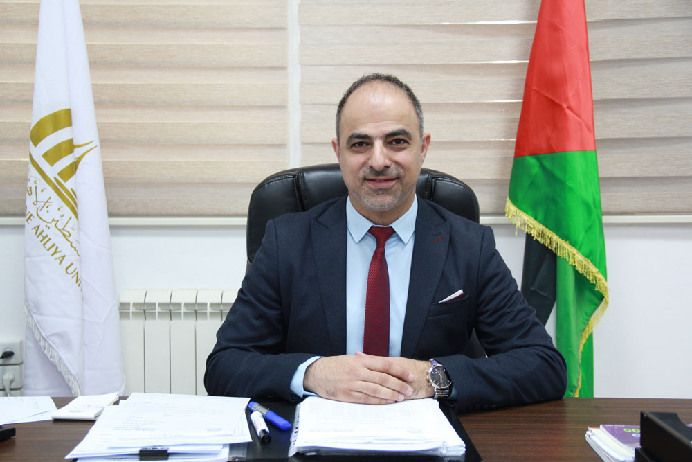الأستاذ جريس أبو غنام - مساعد الرئيس لشؤون العلاقات العامة والدولية